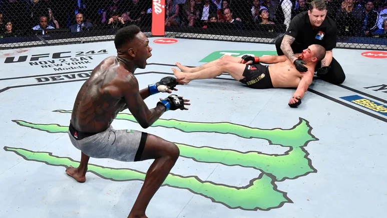 Kiwi Israel Adesanya knocks out Robert Whittaker to win UFC's undisputed middleweight title