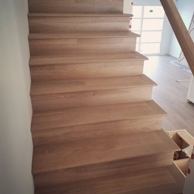 One of our most popular requests this year, extending the hardwood up the stairwell 👌 
Check out how this beautiful white oak staircase, with a matte finish, added design and interest to this staircase. Just awaiting it&rsquo;s custom railing for ev