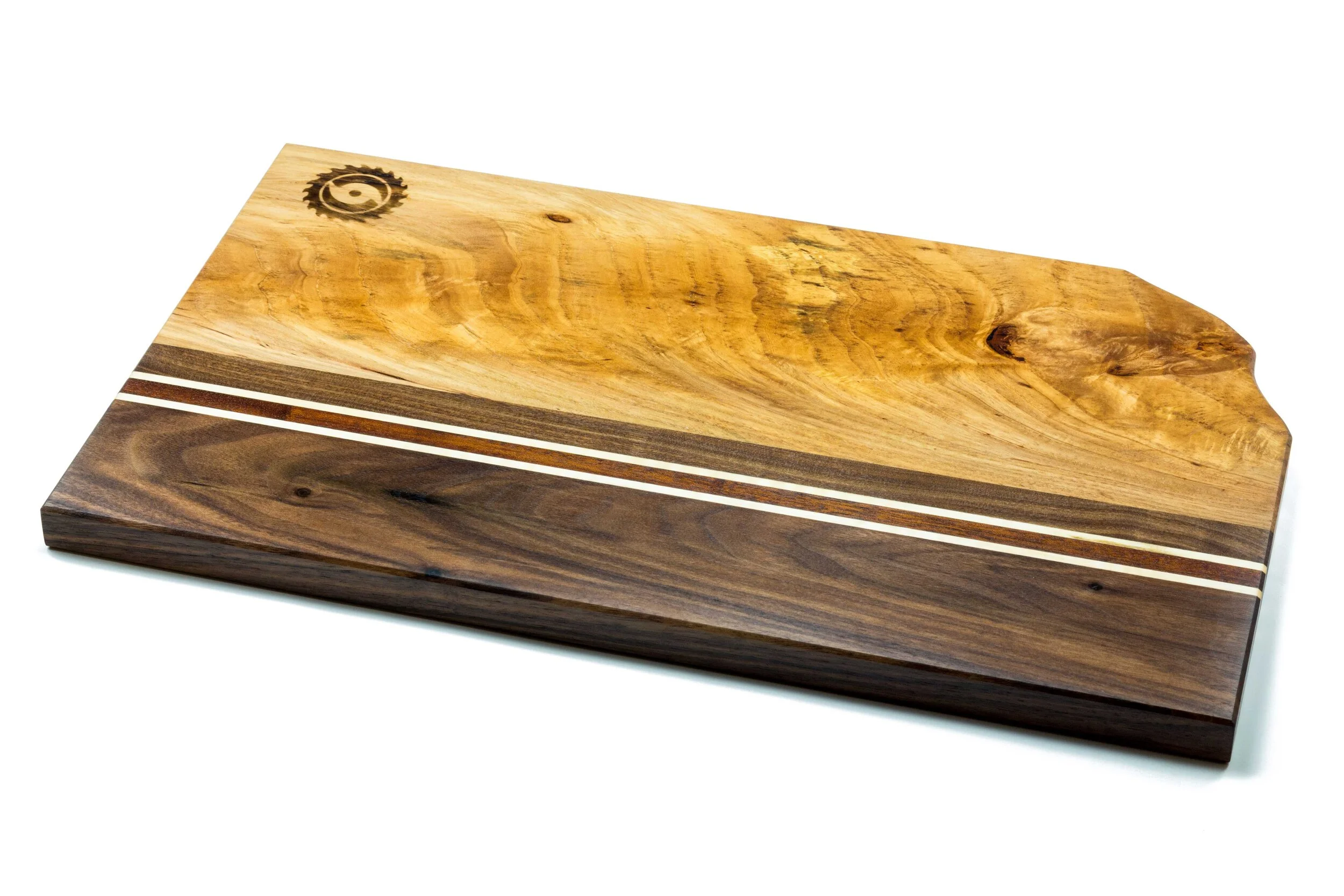 Cutting board of Limba, Jatoba, Black Walnut, and Maple hardwoods made in New Orleans
