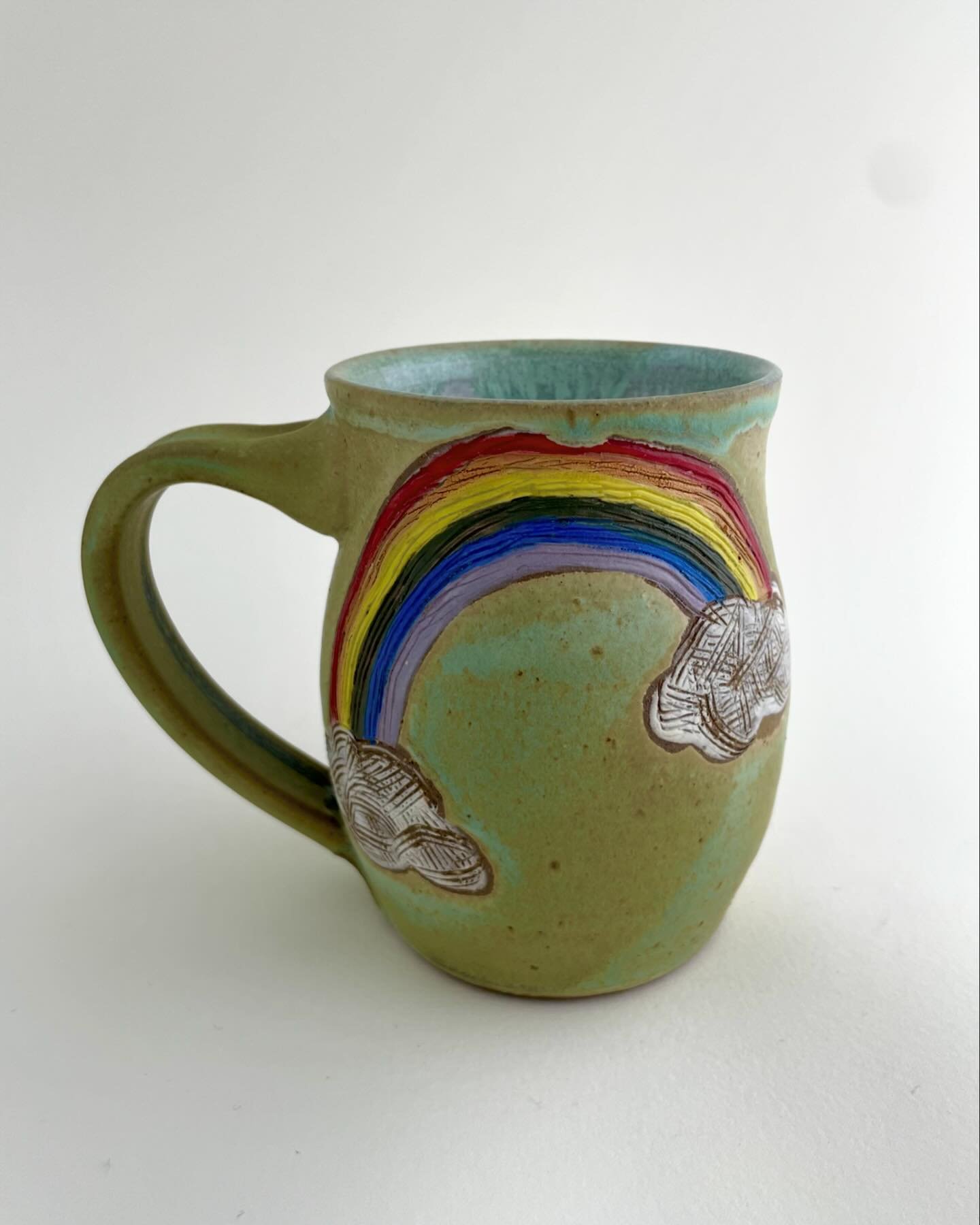 For the first day of spring, I have a handful of rainbow and cloudy day mugs in the shop. These rainbows are so time consuming to paint I don&rsquo;t think they&rsquo;ll be a regular thing - but a good project for times when we really need a break in