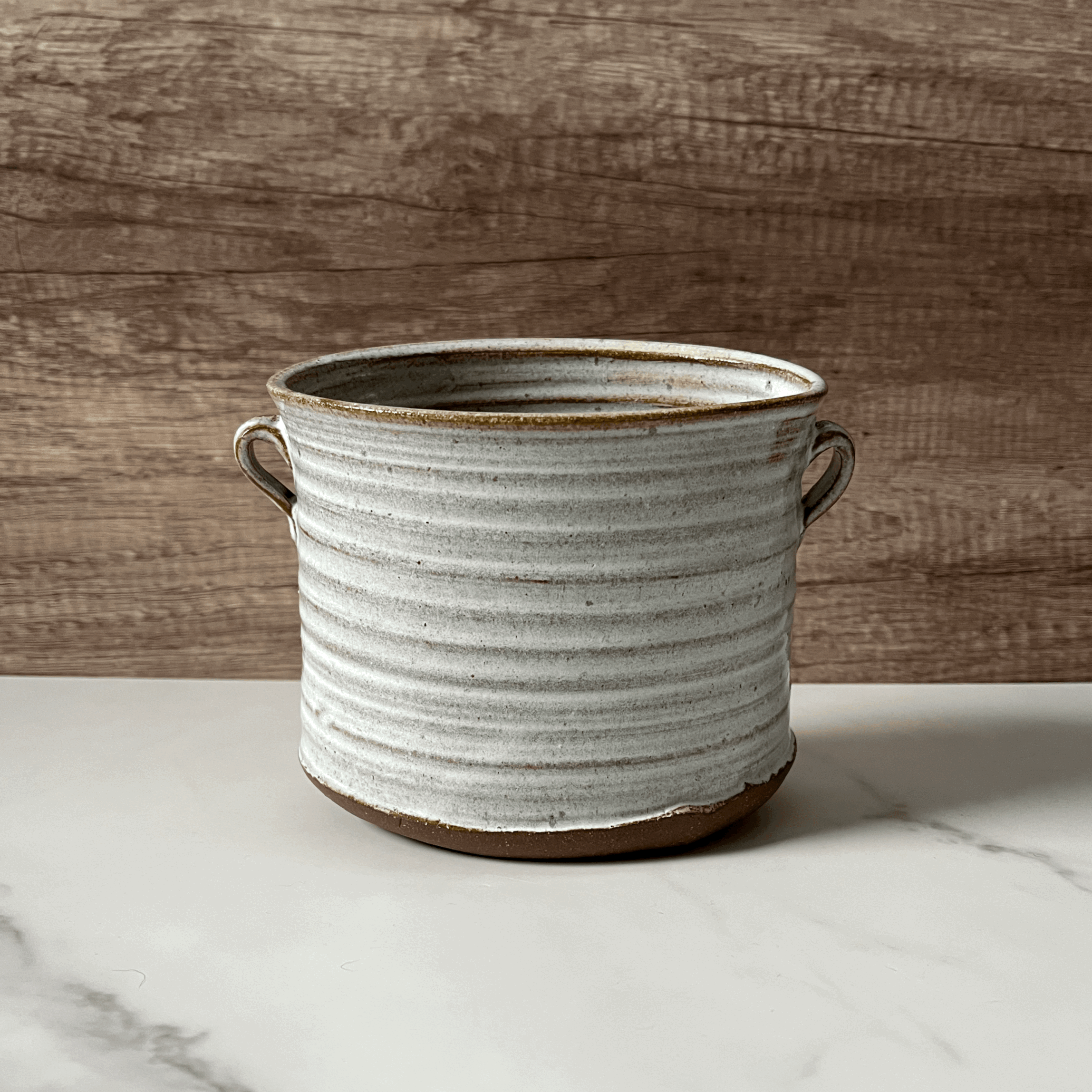Oval utensil crock or vase
