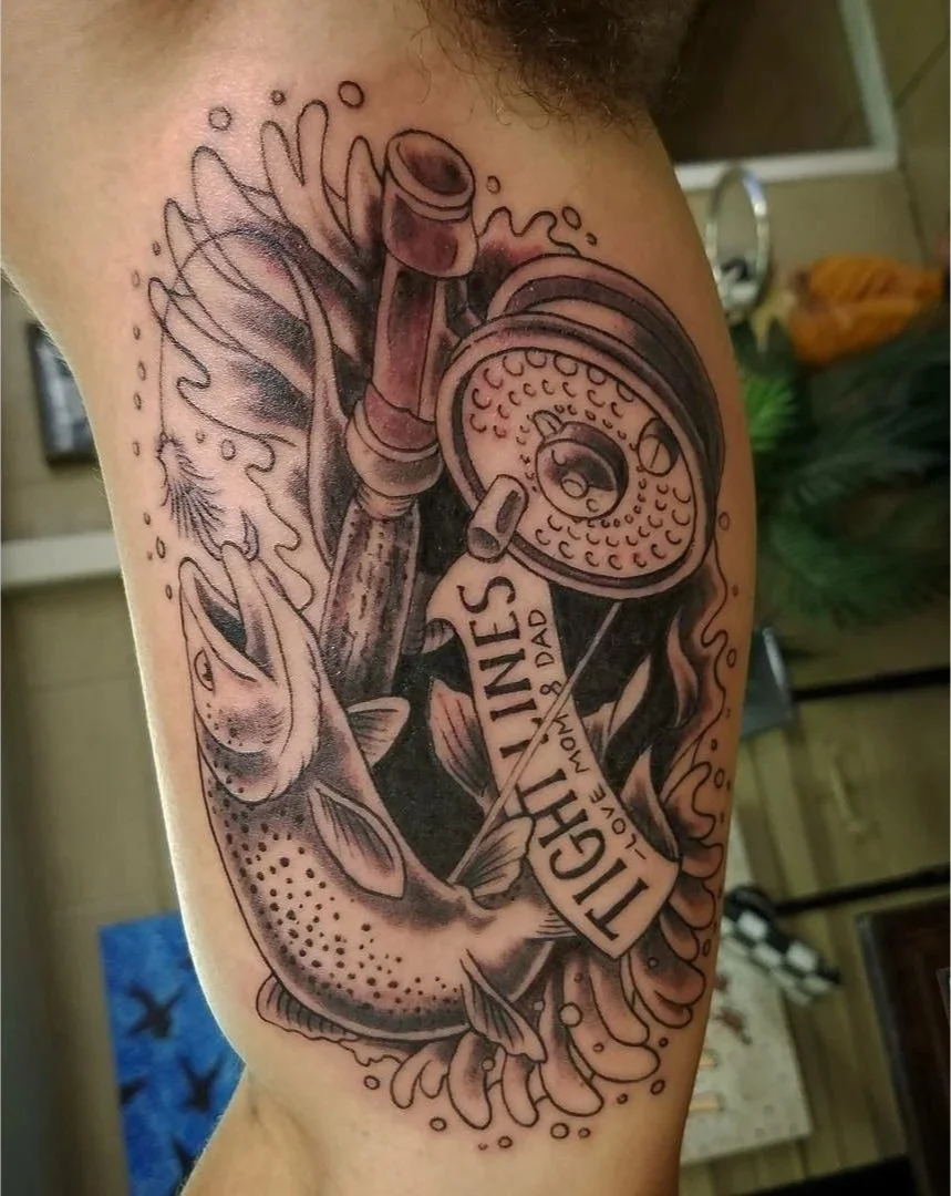 Tattoo of a fishing scene with a fish, fishing reel, and fishing rod, along with the text "Tight Lines, Love Mom & Dad".