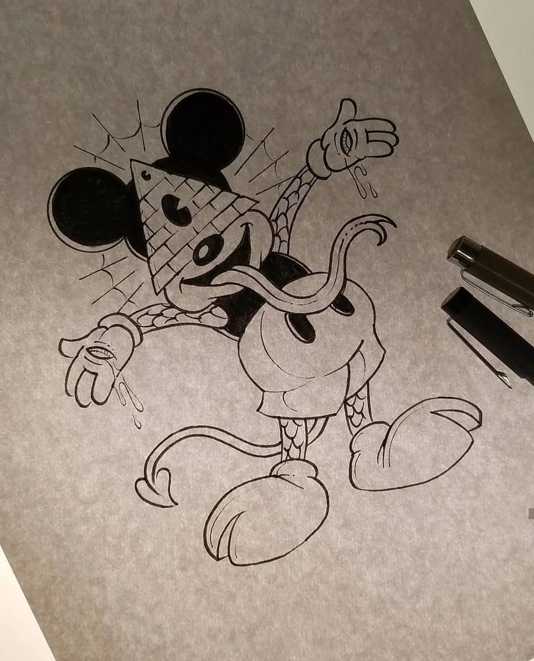 Black and white drawing of Mickey Mouse with an all-seeing eye pyramid face, making a silly face and sticking out his forked-tongue, with devil tail and a hoofed feet.