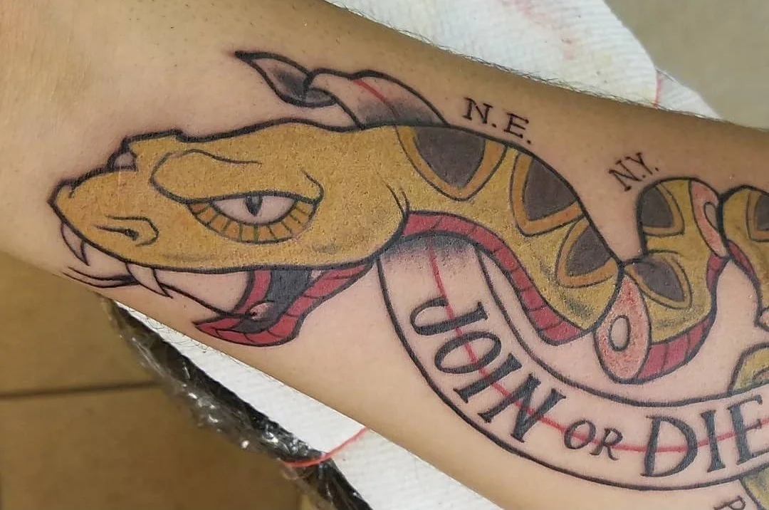 House of Ink Tattoo Description: Forearm Tattoo, full color, neo-traditional, "join or die" snake, patriot tattoo