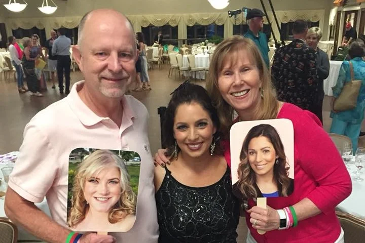 George and Nancee with Nicole and Signs.jpg