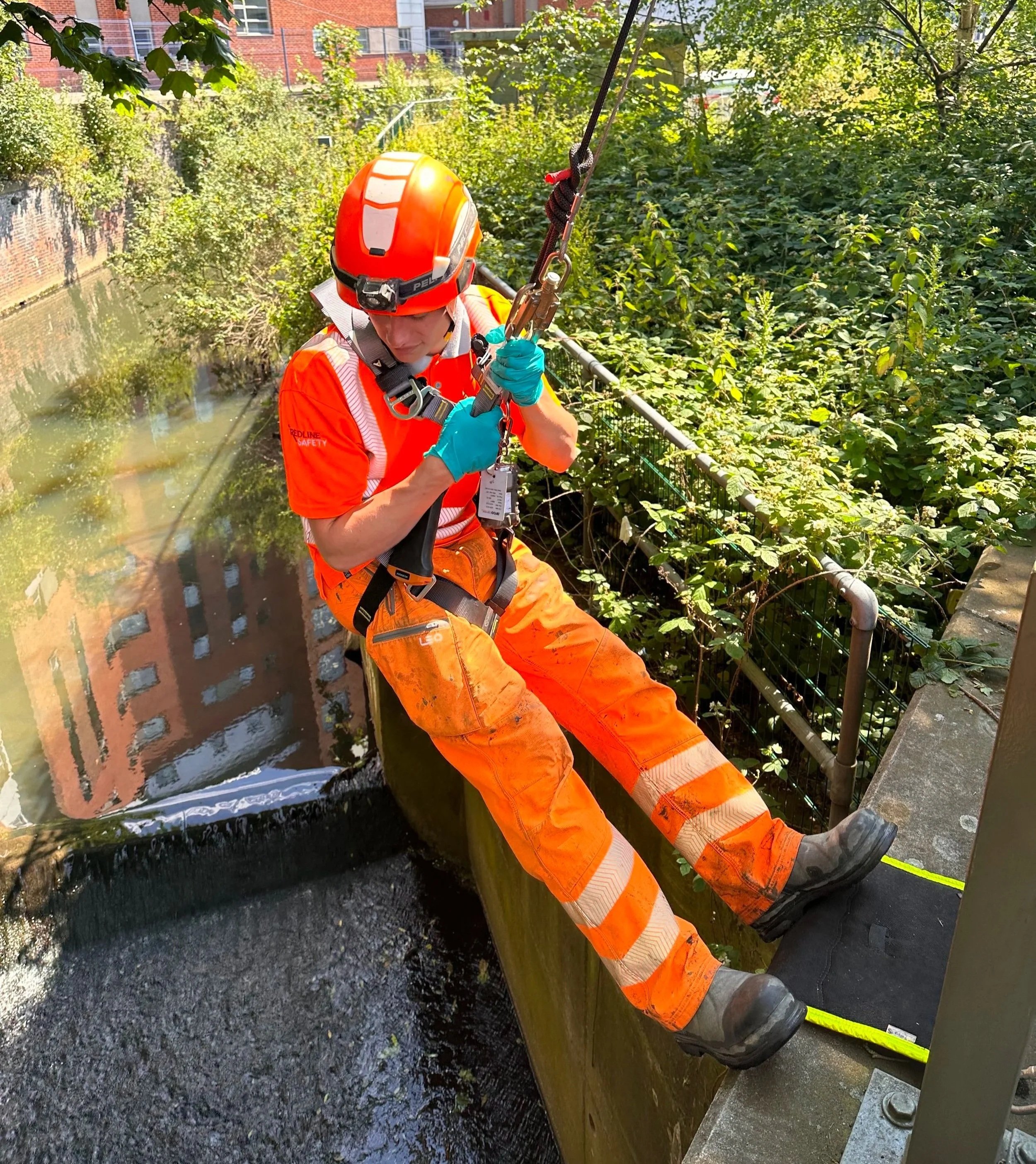 Using roped access to gain entry to culvert.jpg