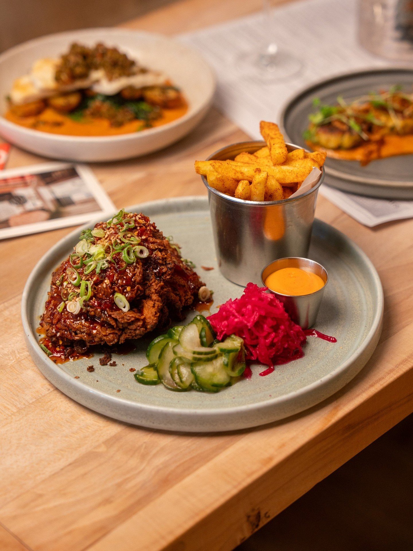 Crispy fried chicken, sharp Korean pickles, a heap of chilli fries and a proper swipe of gochujang mayo tying it all together. Pick your heat, sweet chilli or chilli cider vinegar, and let the Korean Fried Chilli Chicken take it from there.

#risewes