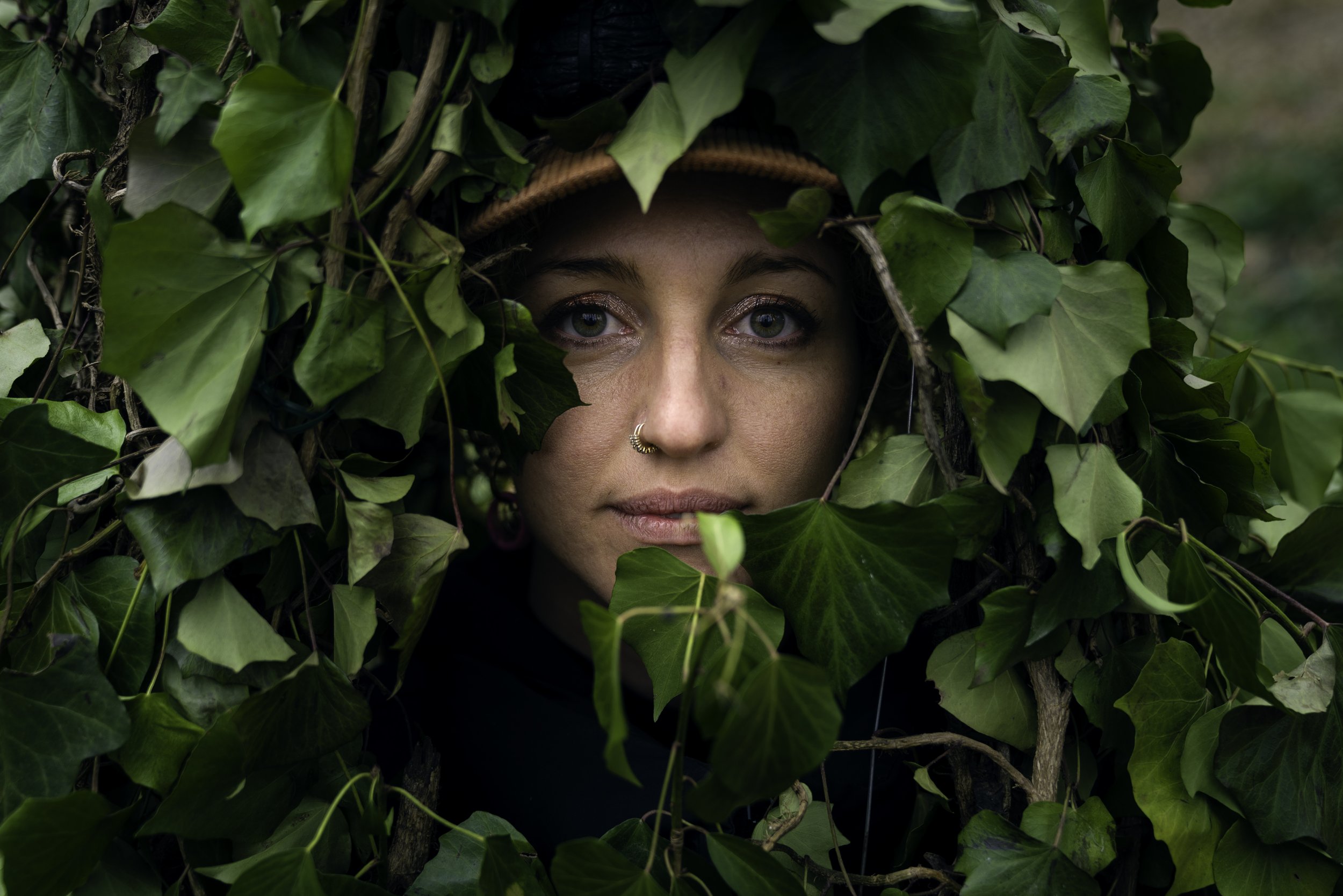 A scene from the Italian festival The Walking Forest, a local dresses as a tree in this historic tradition.