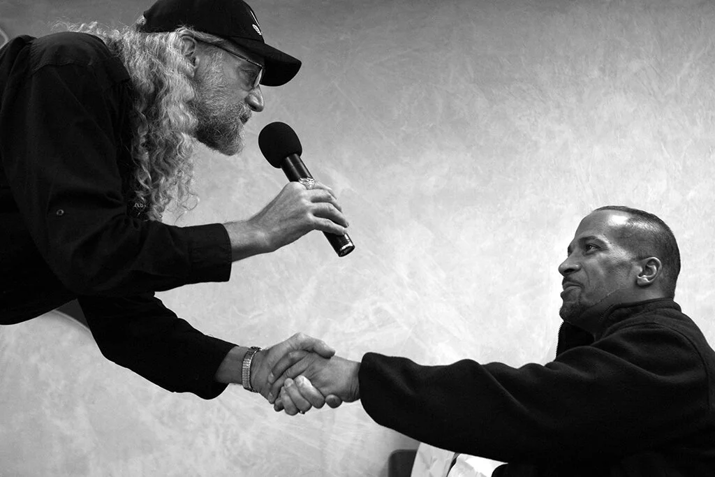  Pastor Steve Upshur, 57, of Clinton Twp, includes Lloyd Byron Martell, 41, of Detroit in his sermon at Peacemakers International Church in Detroit, Tuesday, Oct. 31, 2006. Martell, who is temporarily staying at the Jesus House, owned by Peacemakers 