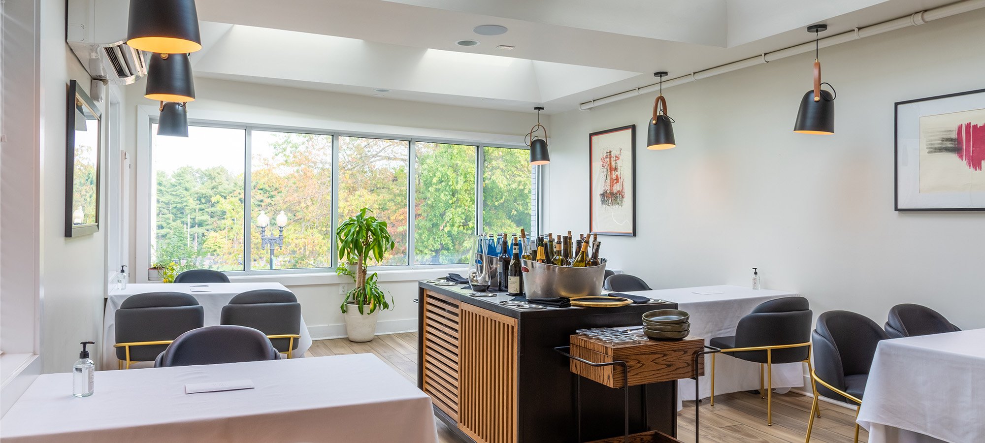 The sunlit interior of Xiquet's intimate dining space in Washington DC