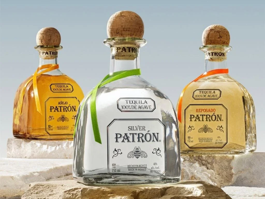 How do Tequila brands express their identity through bottle designs