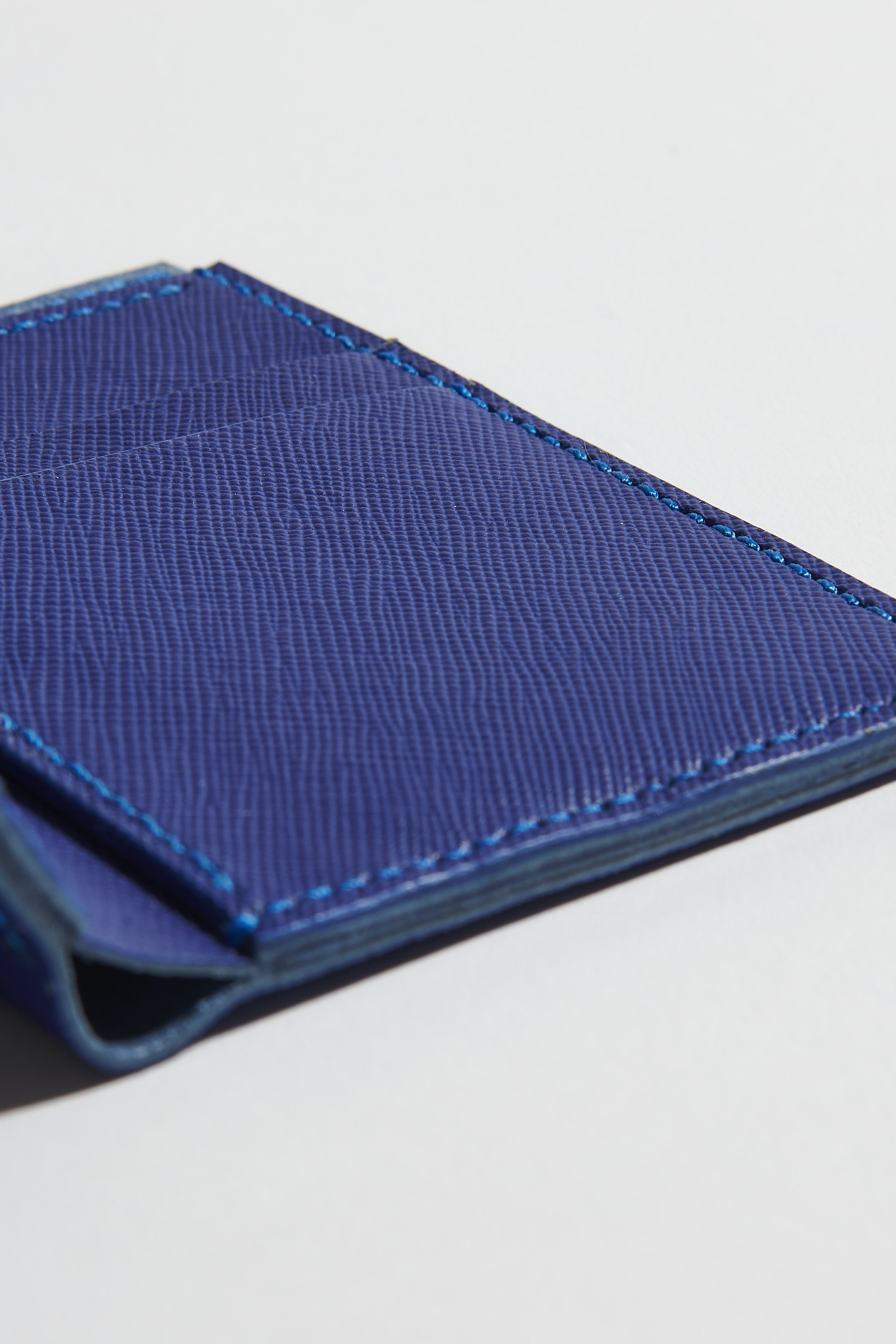 detailed shot of the Frankie bifold wallet stitching
