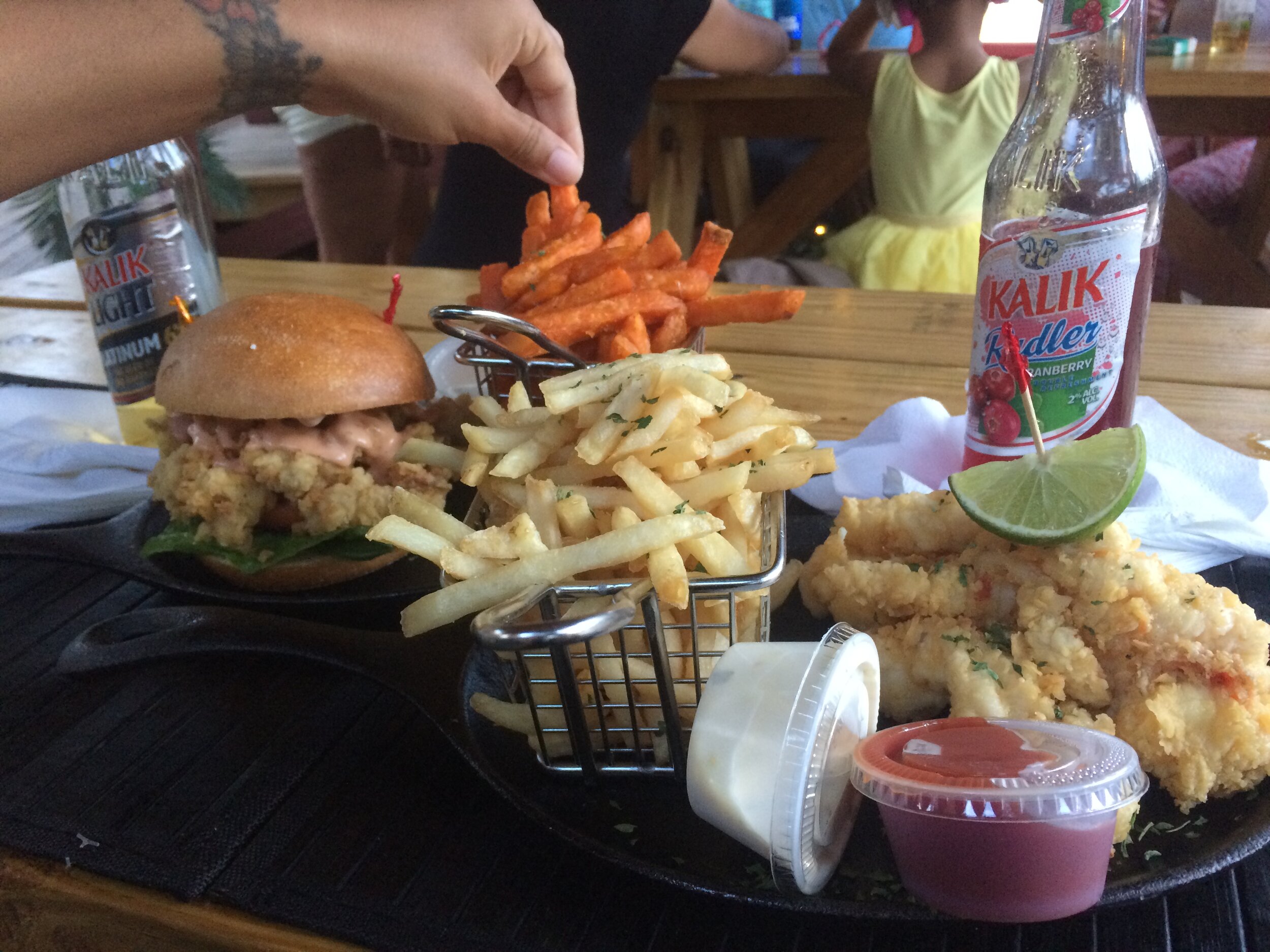 Conch Burger and Fish Fingers with Fries
