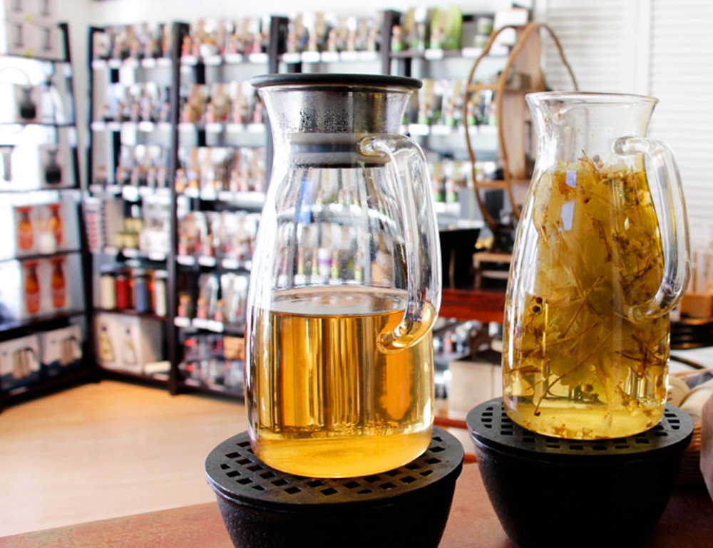 two pitchers of brewed tea in the Arogya wellness center
