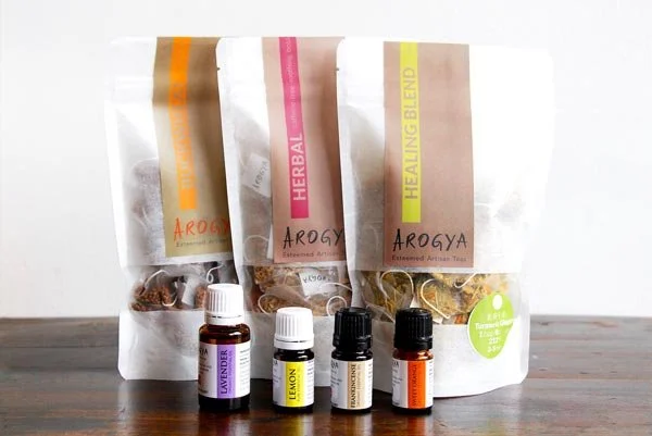 Three Arogya teas in tea bags and four essential oil blends