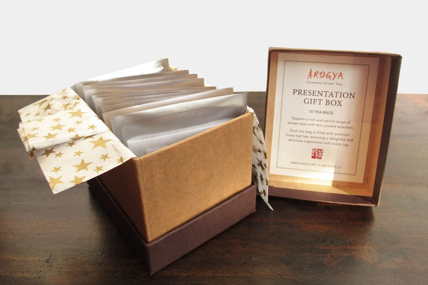 Open tea gift box displaying the ten teabags