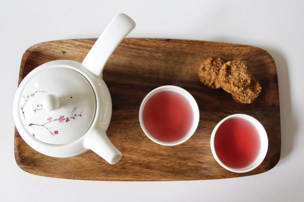 Kyusu Tea Set next to two cups of tea