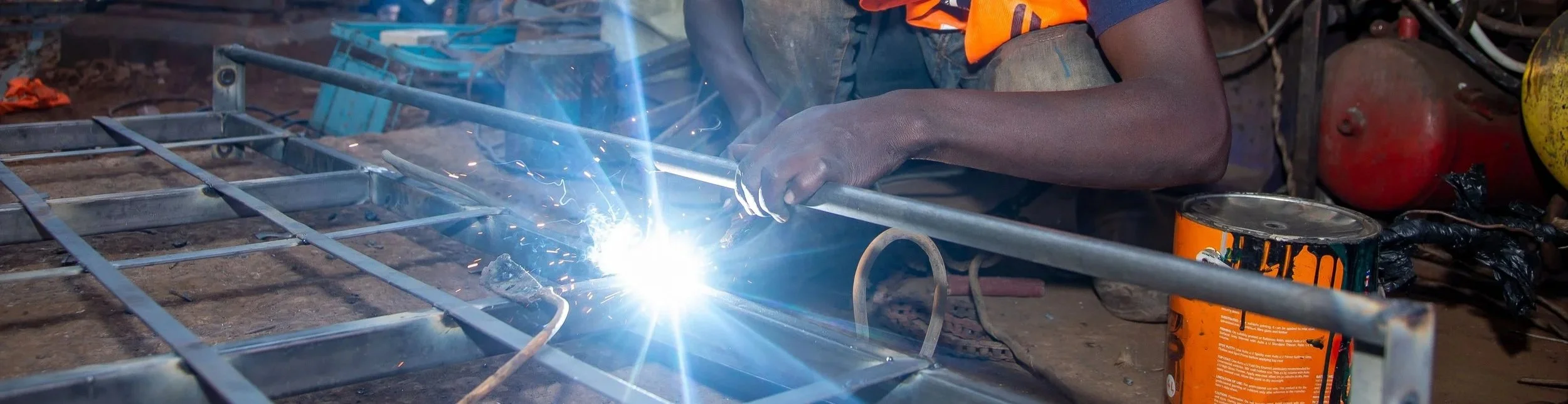 A program participant working in welding as a new livelihood opportunity.