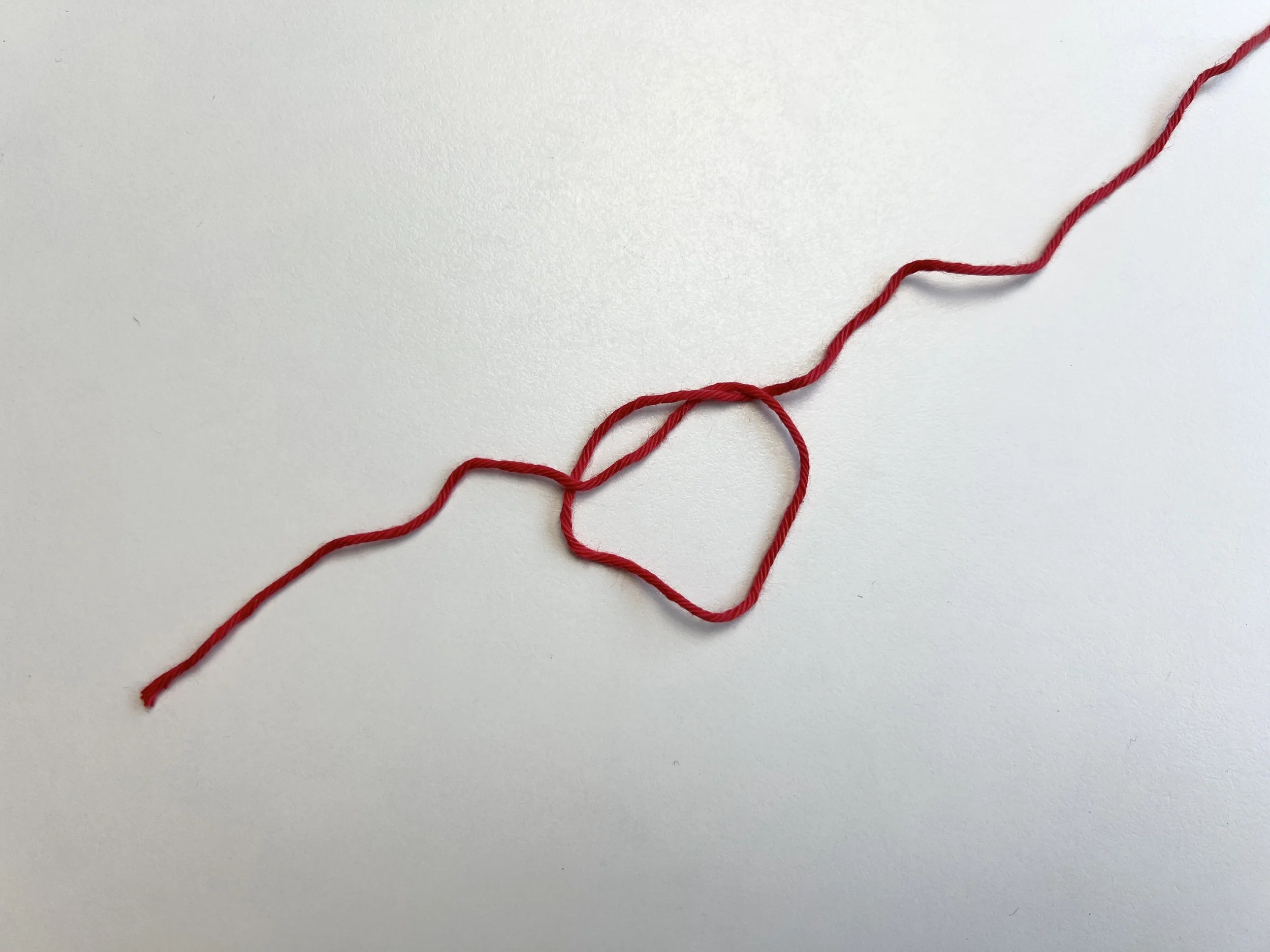  Crochet magic ring technique with red yarn. 
