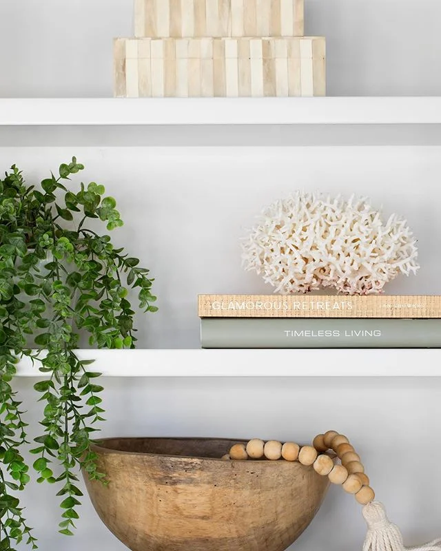 I moved house yesterday. I was reminded why I don&rsquo;t move house very often - it&rsquo;s the cleaning! #PAINFUL 😩😩 I can pack up and style homes every day of the week and I love it. But when it comes to packing my own home and making sure I don&rsquo;t forget 37 individual scooter parts, shifting the trampoline without trying to pull it apart 🙄 and remembering to dust the top of the ceiling fans, it drives me insane. Oh, and then there&rsquo;s the toilet brushes - I hate moving those things. Does anyone else struggle with the toilet brushes?

But the best part is the anticipation of getting to set up in our brand new home and putting together all the little things that make a house a home. Little collections of treasured belongings that all have a special meaning, like this vignette created in one of our projects by our queen of shelf styling, Kyla. Can&rsquo;t wait to style up a storm in this new house - Kyla, head over for a coffee girlfriend 😂