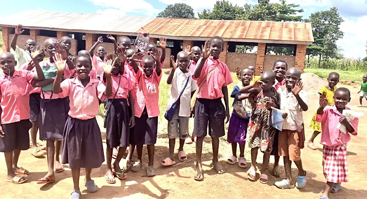 23 alenga primary school kids waving goodbye.jpeg