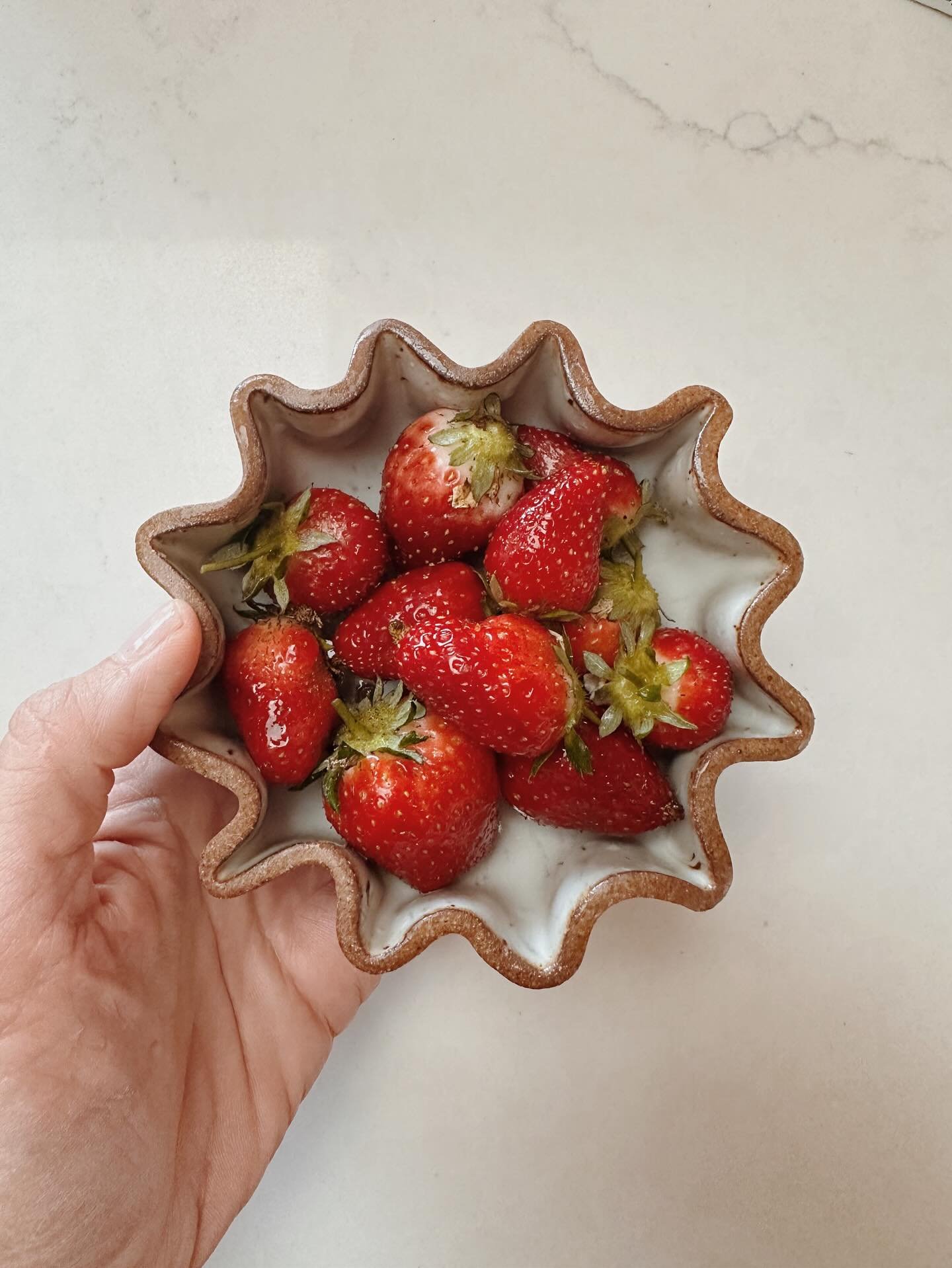 New berry bowl design just in time for strawberry season 🍓 Perfect for rinsing + serving summer fruit. More coming for the art festival&mdash;and a few will be available online too!

#loveceramic #potteryforall #handbuilding #helloimhandmade #handma