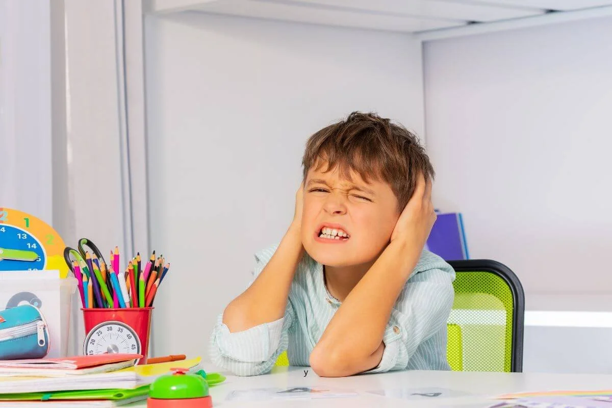 Child showing signs of sensory overwhelm that may indicate a need for ADHD Testing and Autism Assessment in Middlesex, NJ 08846