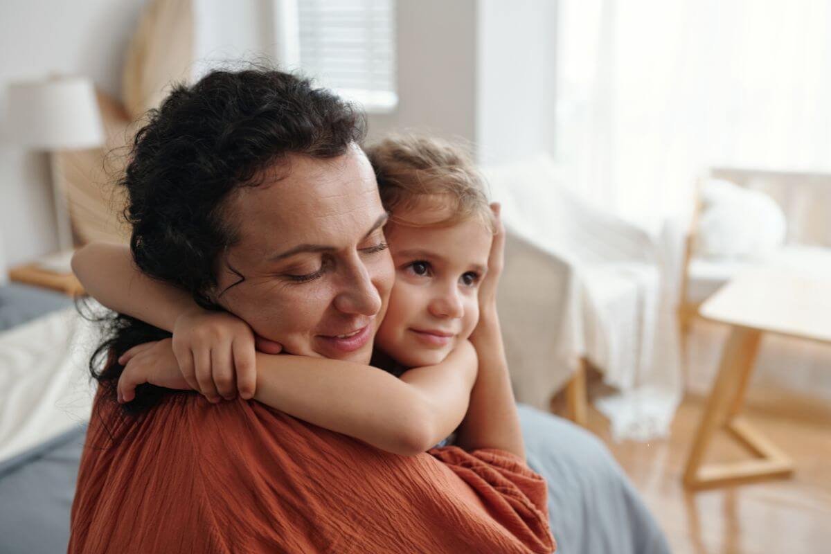 A mother hugging her child at home after learning about private ADHD and Autism evaluation options in New Jersey