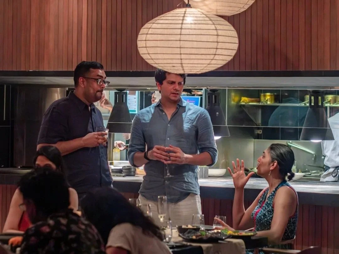 guests enjoying food with engaging conversations at embers ubud