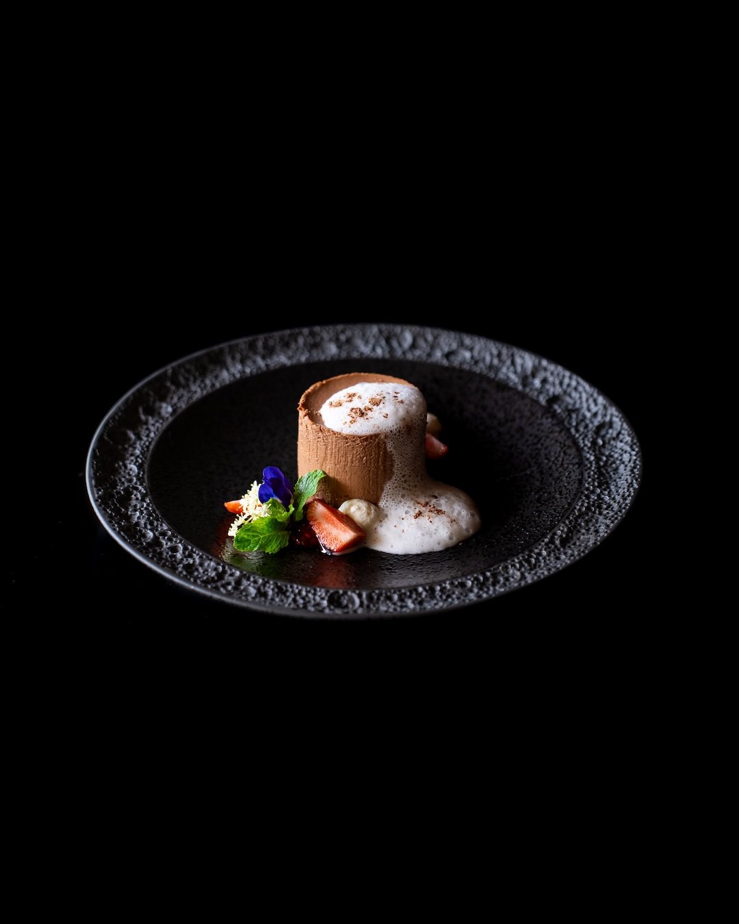 Treat yourself to a taste of luxury with our Chocolate Mousse! Delight in rich chocolate paired with vibrant raspberry gel, delicate white chocolate foam, and a fudgy brownie. It's a symphony of flavors that will leave you craving more. 🍫😋

CHOCOLA