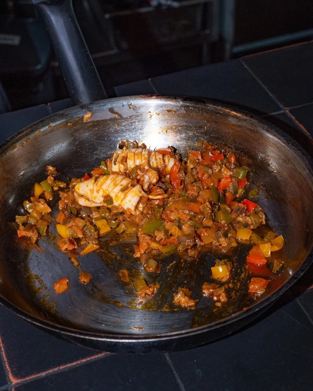 Tender squid meets the bright flavors of caponata, finished with torched lemon and delicate micro herbs. A Mediterranean-inspired starter that balances smoky, citrusy, and savory notes in every bite.

Begin your meal at Embers with a dish designed to