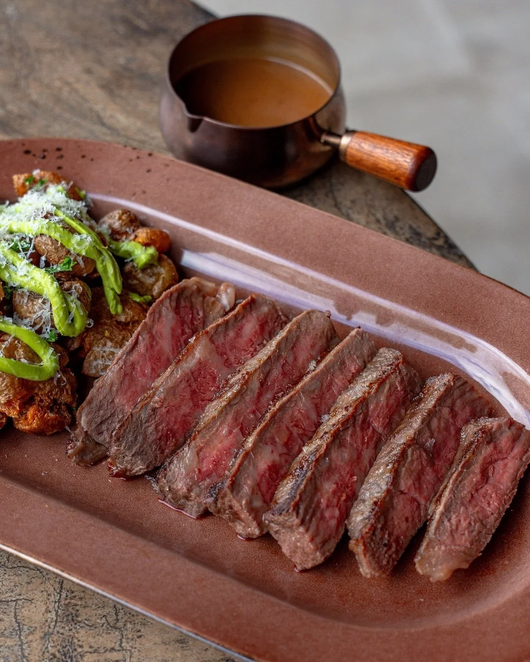 Searching for one of the best steaks in Ubud? Start with the fire.

Our new Citrusfed Wagyu Ribeye AU MB5 is flame-grilled to highlight the exceptional marbling and rich flavor of premium Australian wagyu. Paired with crisped potato spuds, creamy bee
