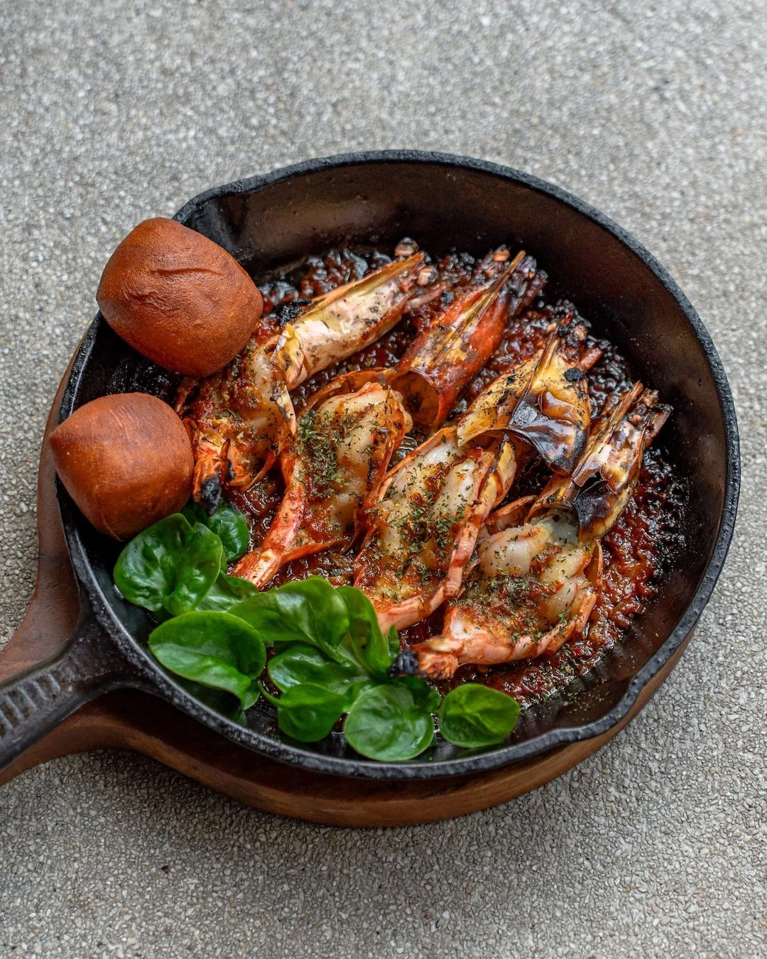 Straight from the fire, with a little heat to follow. 🔥

Our Charcoal Fired Prawns are kissed by the flame, then dressed in zubda fil-fil chili butter, served with crispy mantou and a bright dill gremolata.

Smoky. Spicy. Buttery. Best enjoyed with 