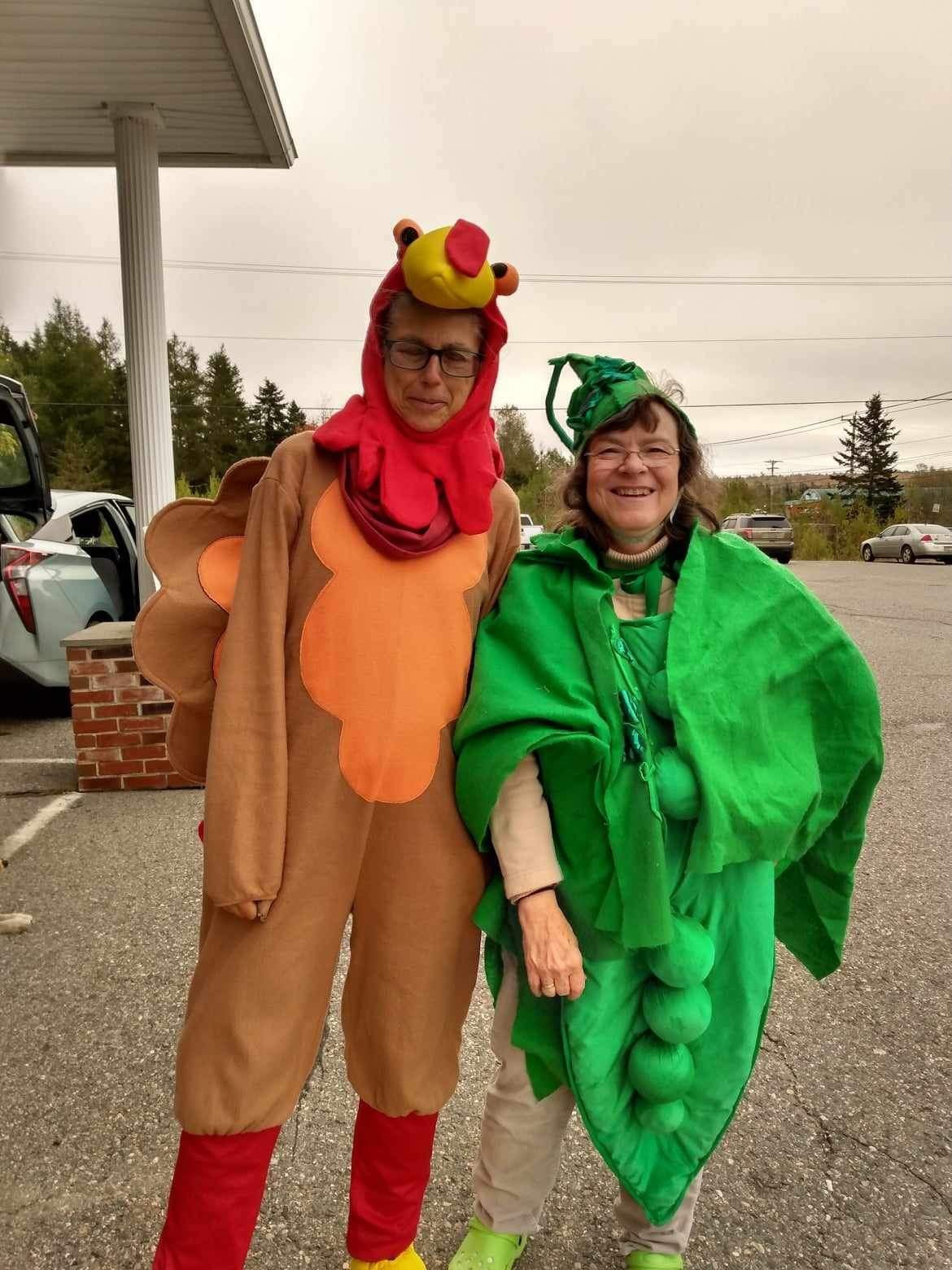  Healthy Acadia's Regina Grabrovac (in turkey costume) and Kim McClure (dressed as a pea pod) stand in the parking lot of Four Corners Shop ‘ Save in Columbia to collect donations during the 19th Annual Washington County Turkey-A-Thon. 