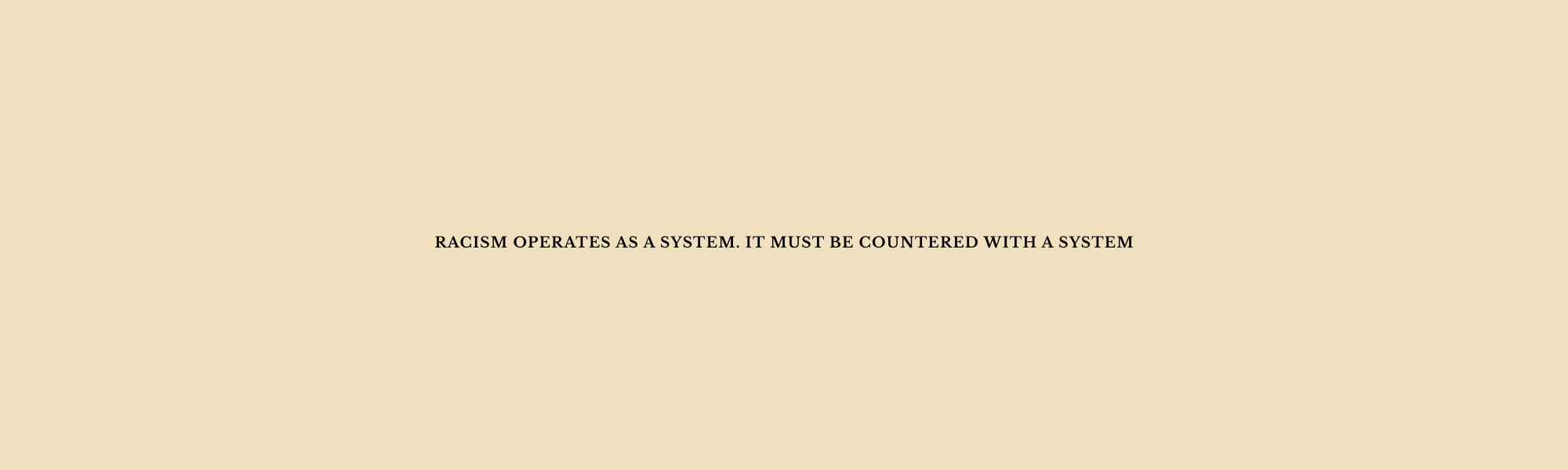 racism is a system.png