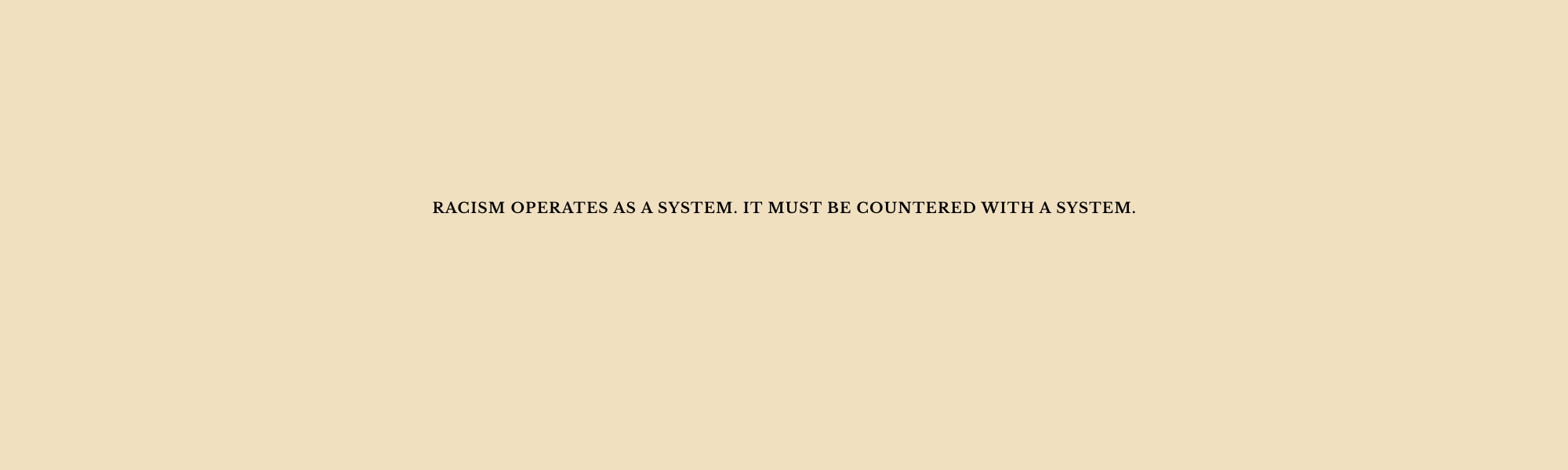 racism is a system.png