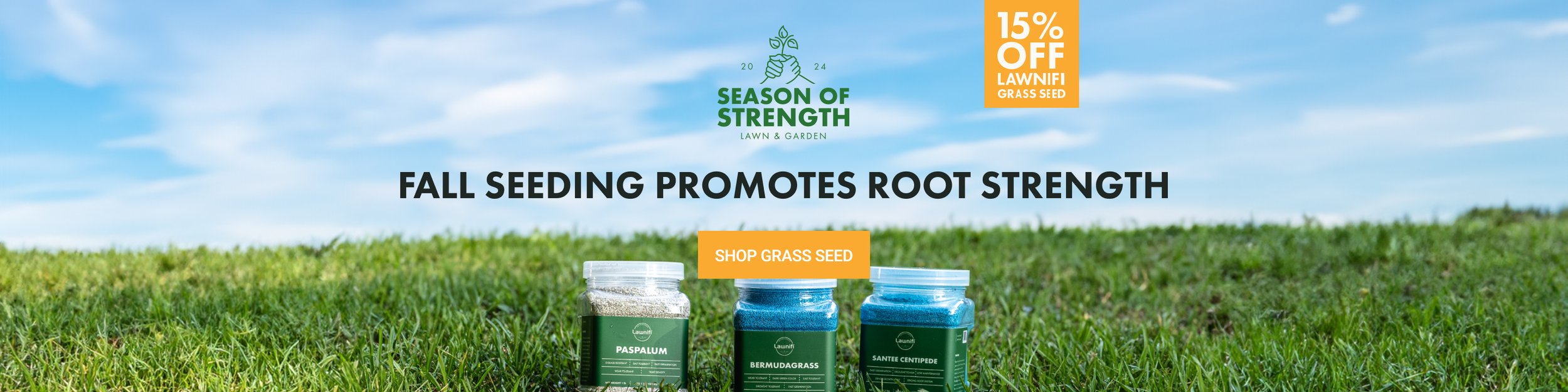 Three jars of grass seed on a grassy field with blue sky and white clouds, advertising fall seeding promotion with 15% off lawns and grass seed.