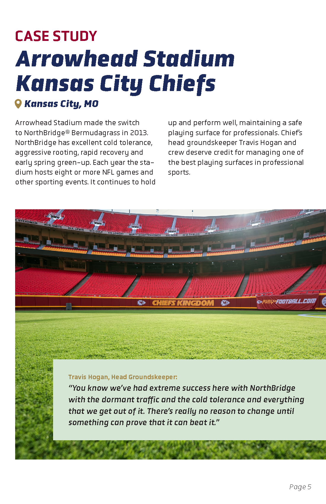 Inside view of Arrowhead Stadium with red and yellow seating, a green football field, and banners with Kansas City Chiefs branding.