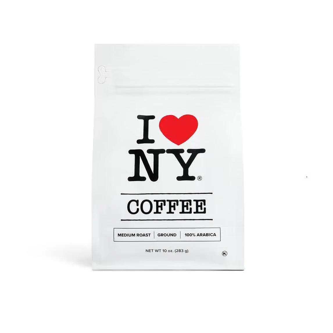A bag of coffee with 'I love NY' printed on it, featuring a red heart in place of the word 'love,' and additional text indicating medium roast, ground, 100% Arabica, 10 ounces.