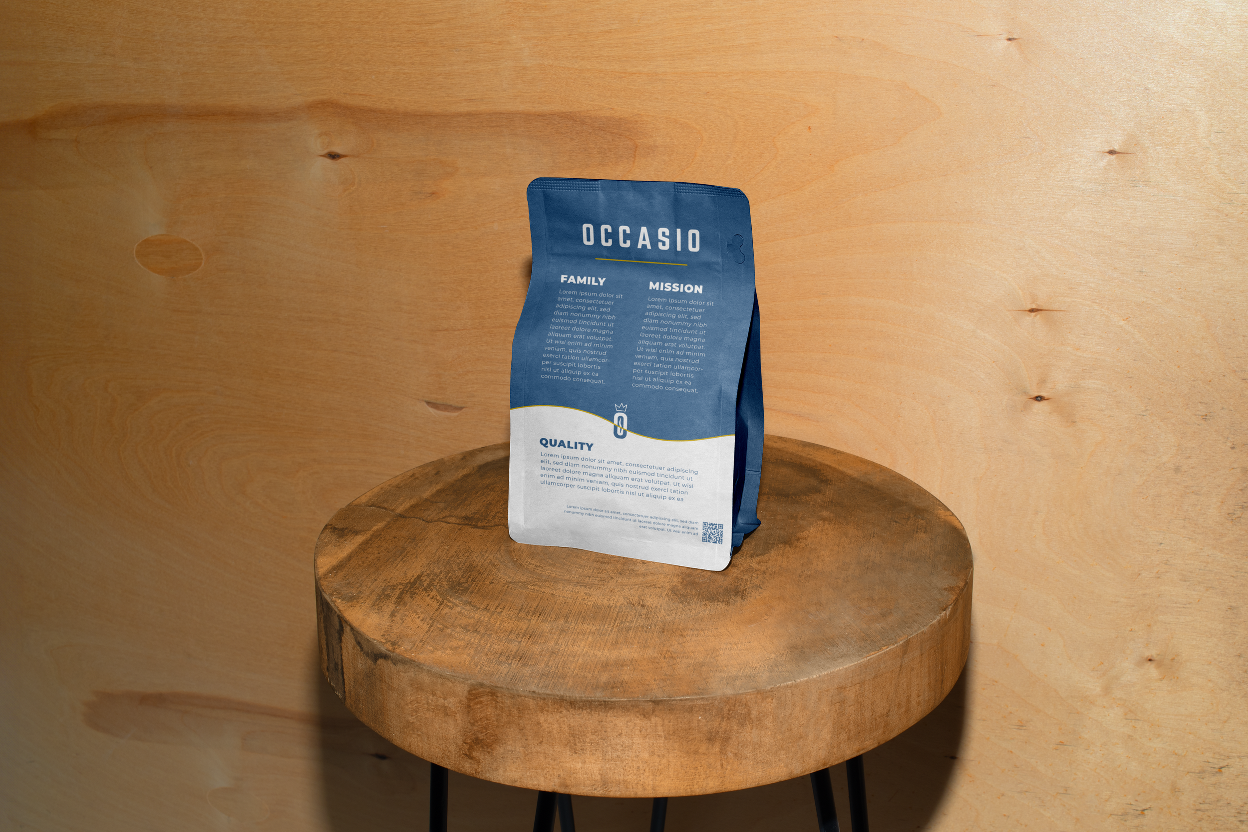 Blue package with the word 'OCCASIO' and placeholder text, placed on a round wooden table against a wood-paneled wall.