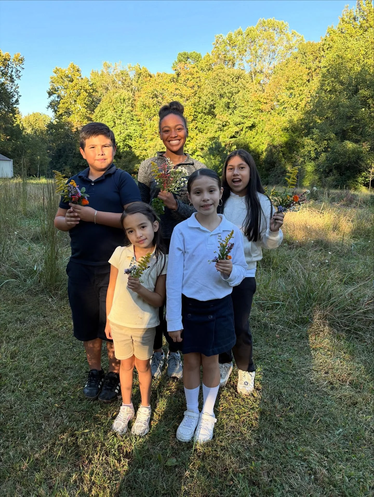 Firefly After-school Program had a delight-filled tour of the food forest this week. The first sign of fall leaves, the evening light, and the plants that wait until fall to bloom— all made it a magical visit. They ran the labyrinth, picked tin