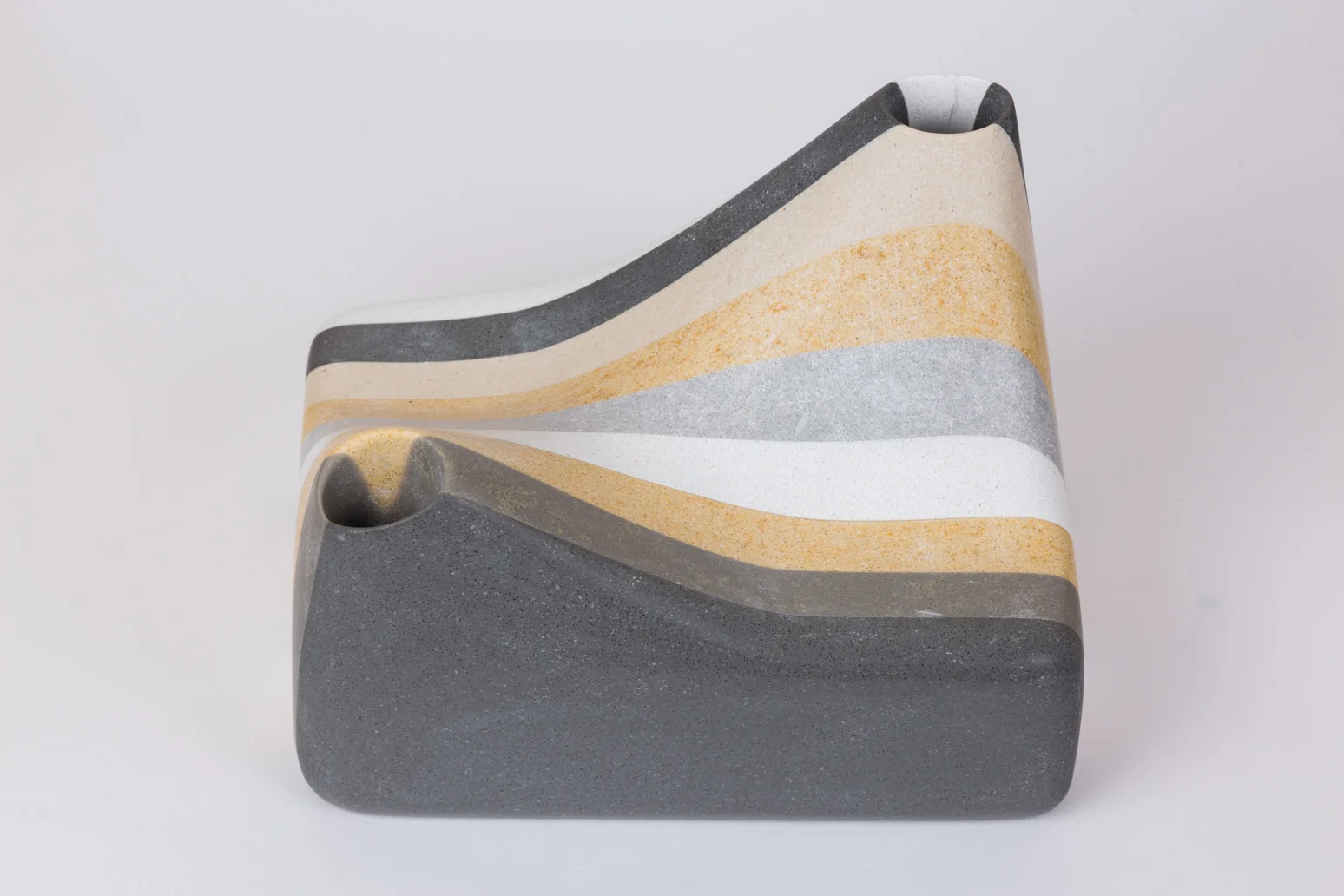vase_six in powder / graphic block The smooth lines of this new-engineered block are the fusion of synthetic resin and recycled natural stone powder.
