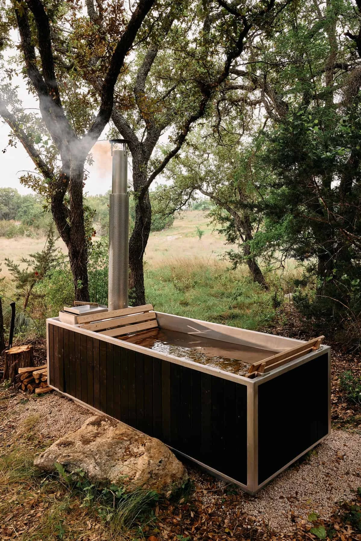 Wood fired hot tub at NowHere nature cabins