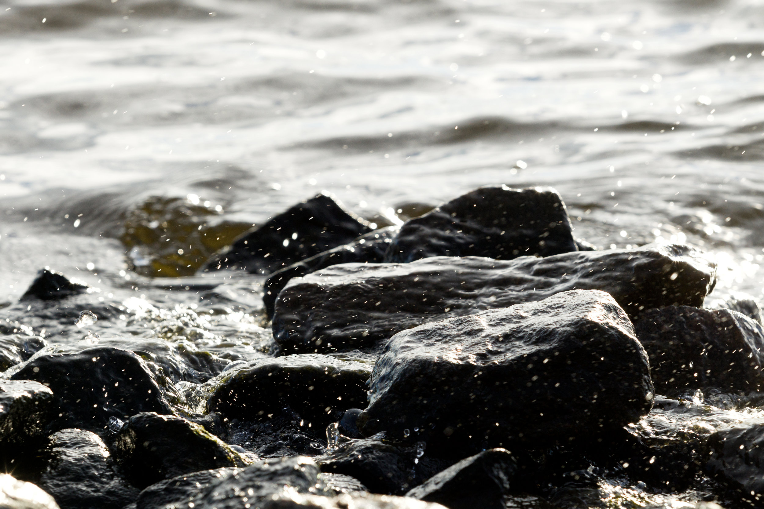 coastal-rocks-on-wave-background-PTCS6BD.jpg