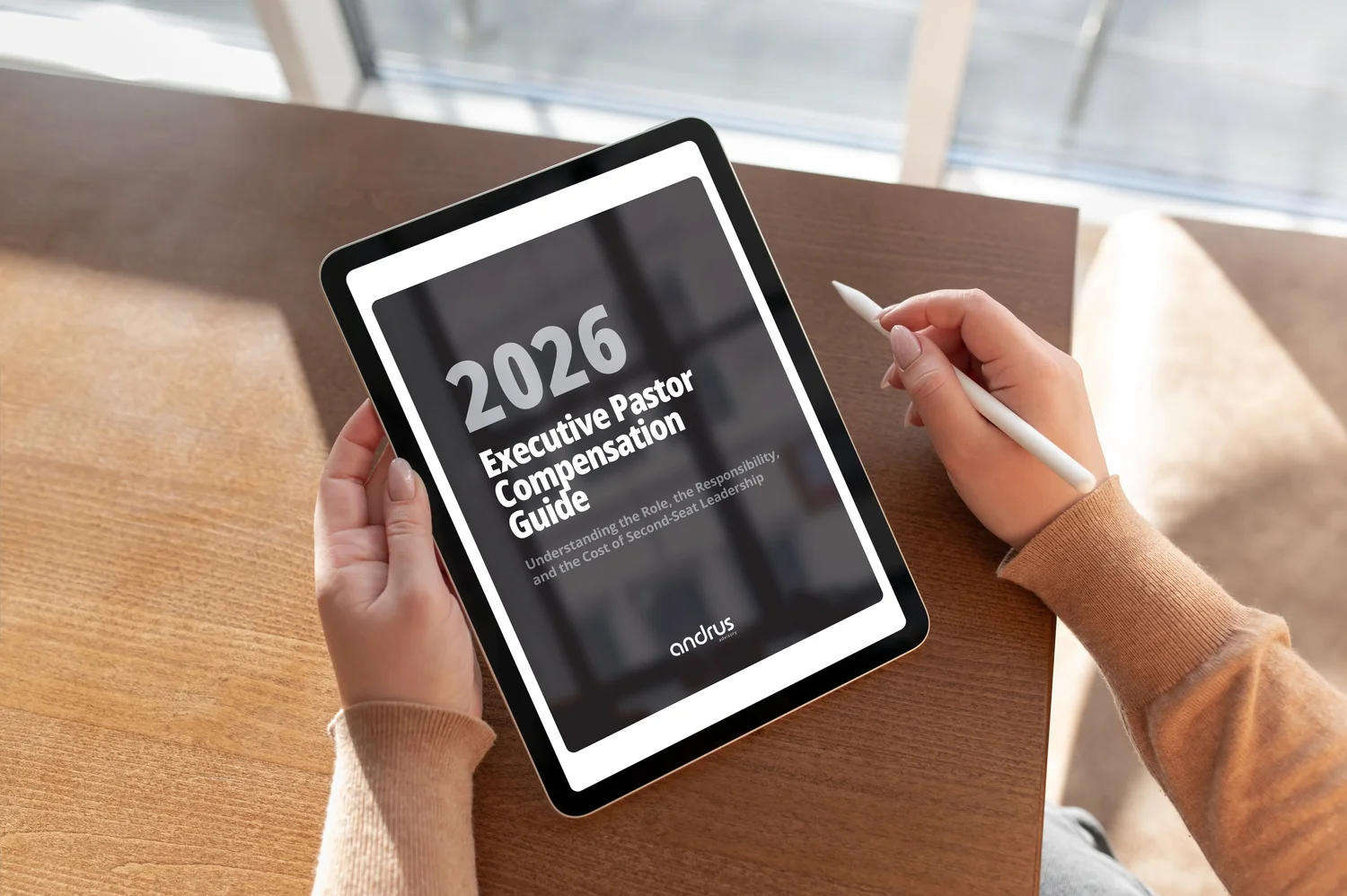 2026 Executive Pastor Compensation Guide shown on a tablet