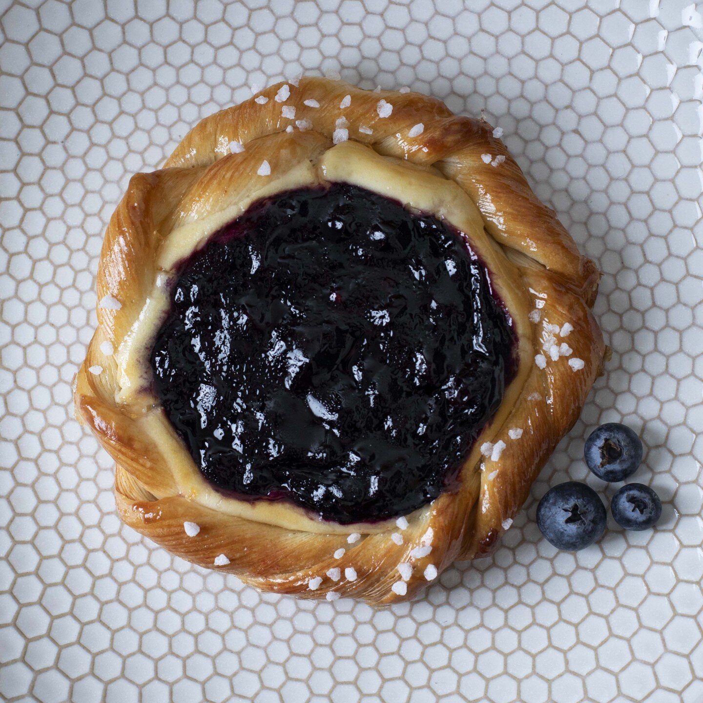 Welcome our new seasonal breakfast pastry, the Blueberry Cream Cheese Danish! This sweet and tangy treat is the perfect pairing for your morning tea or coffee.