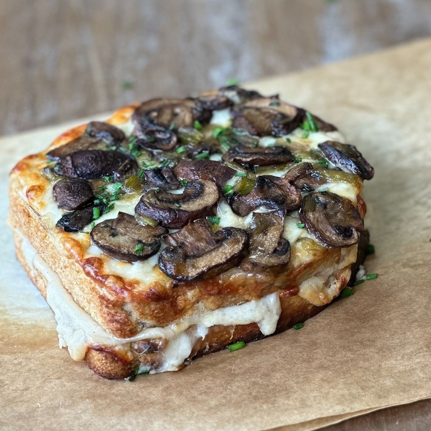 A brand new sandwich will be joining our menu for ONE DAY ONLY on Thursday, April 18th: the Mushroom Croque Monsieur! Roasted mushrooms are paired with leeks, black truffle oil, b&eacute;chamel, and gruy&egrave;re cheese, all on our freshly baked pai