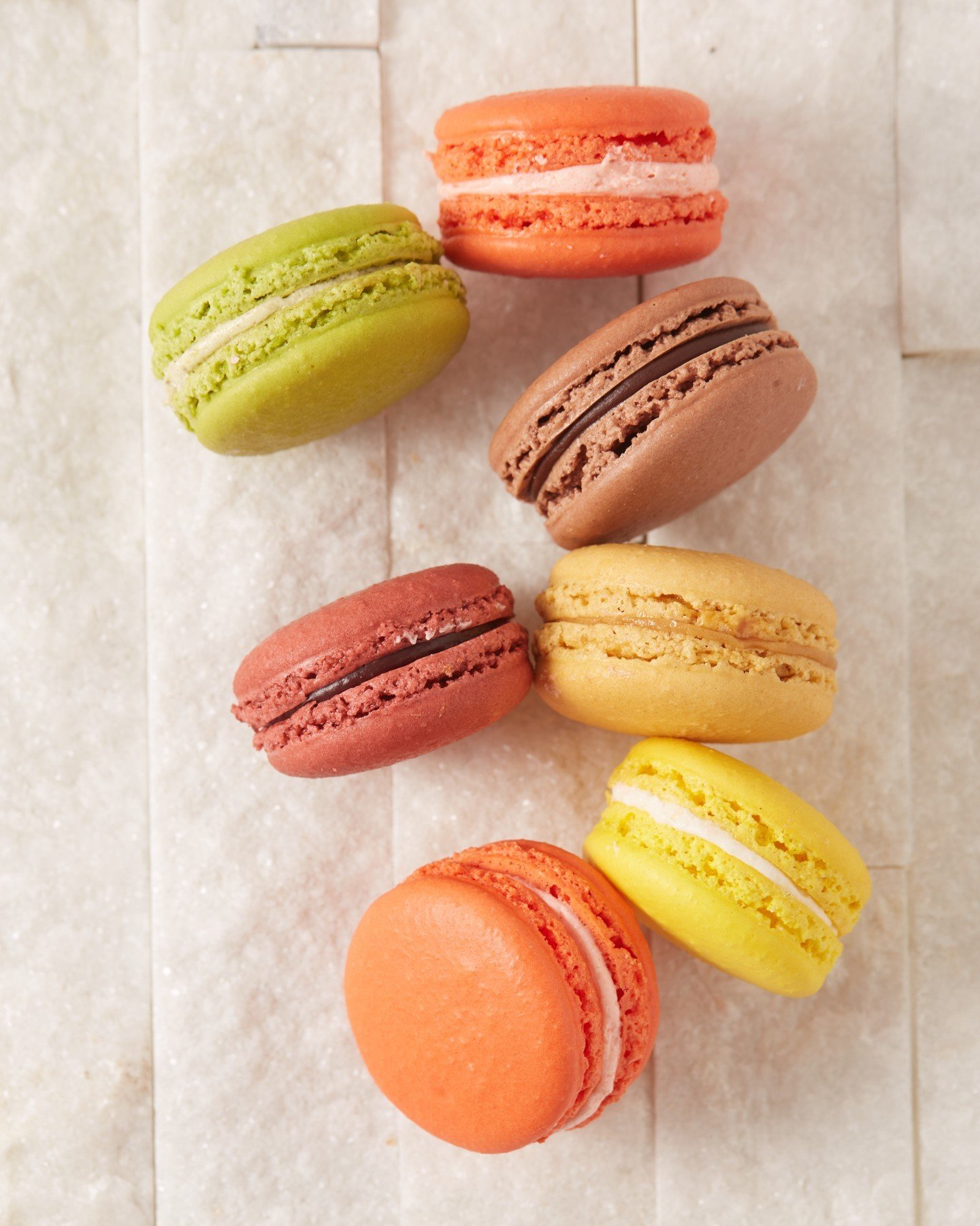 Our macarons are made in house every day in a variety of seasonal flavors. These sweet sandwich cookies are perfect on-the-go, and make great gifts or favors for weddings and other events!