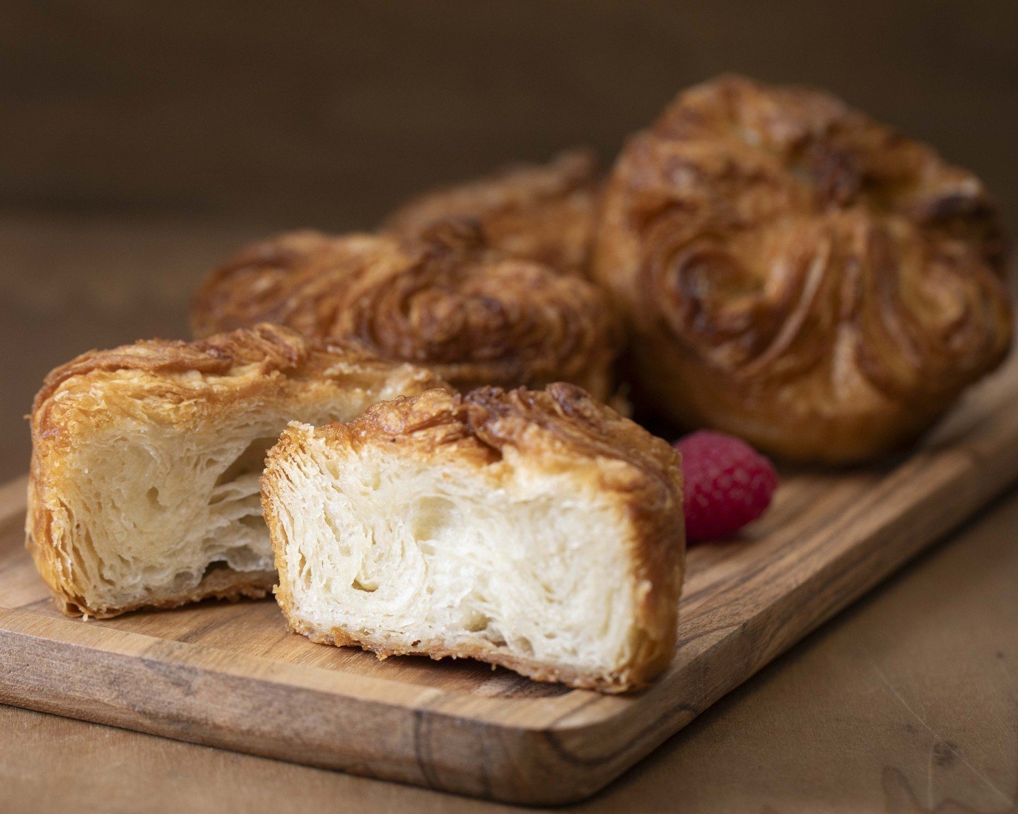 Craving something divine? Look no further than our mouthwatering Kouign Amann! Buttery, flaky, sweet, and oh-so-delicious, it is the perfect pastry pick-me-up for any time of day. Go ahead, treat yourself!