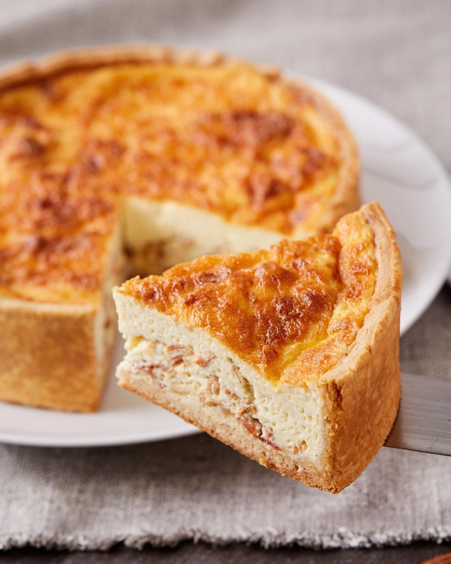 Rich, savory, and endlessly versatile, our Bacon Quiche is delicious morning, noon, or night. Order a slice for yourself or a whole quiche to share.